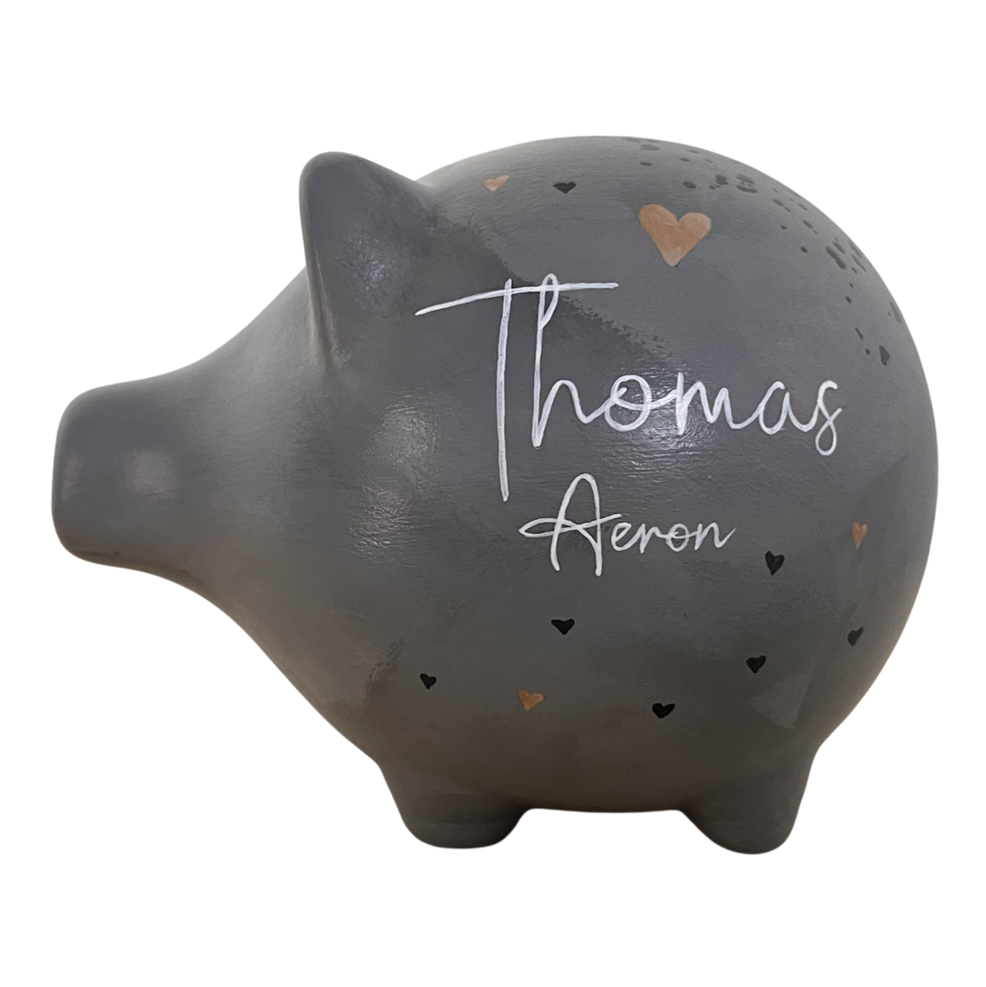 Grijs spaarvarken met gouden en zwarte hartjes en namen Thomas Aeron.